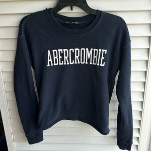 Navy blue Abercrombie sweater. Cute knot back!